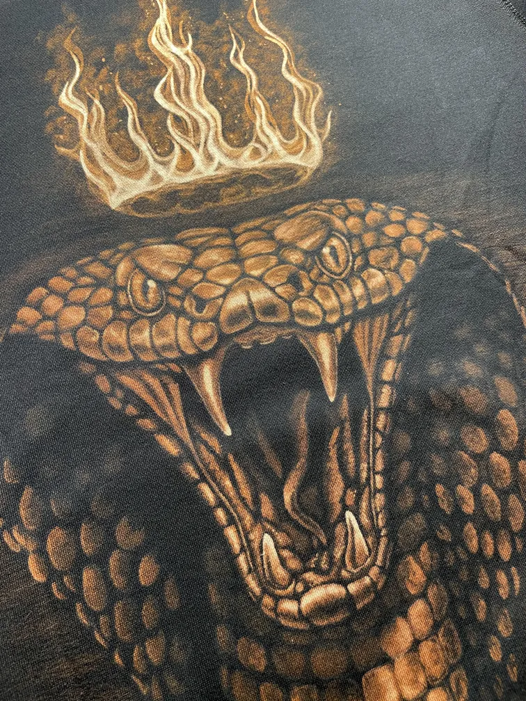 Close-up of a royal cobra illustration with detailed scales in bleach art style