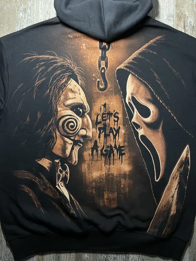 Closer view of the hand created Ghostface and Billy the Puppet bleach artwork on the back of a black hoodie