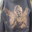 Live video showing the full skeleton fairy bleach art design on the back of the hoodie