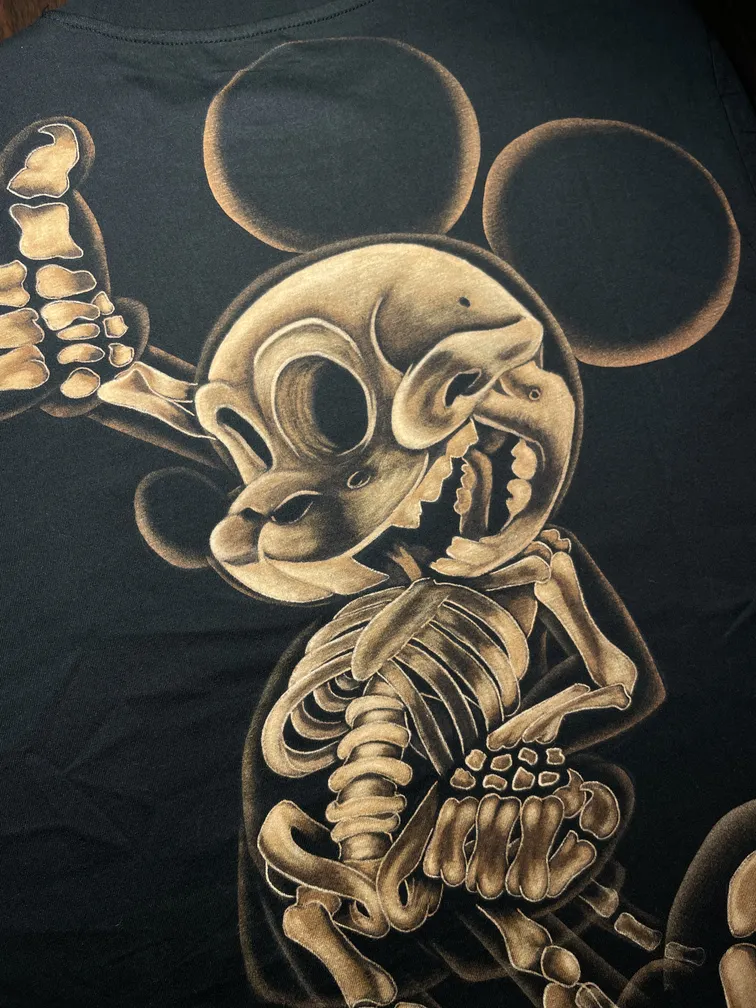 Close-up of a cartoon mouse skeleton illustration in x-ray inspired bleach art style