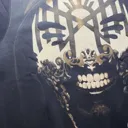 Video showing the full hand-painted Sleep Token inspired bleach art illustration on the back of the zip hoodie