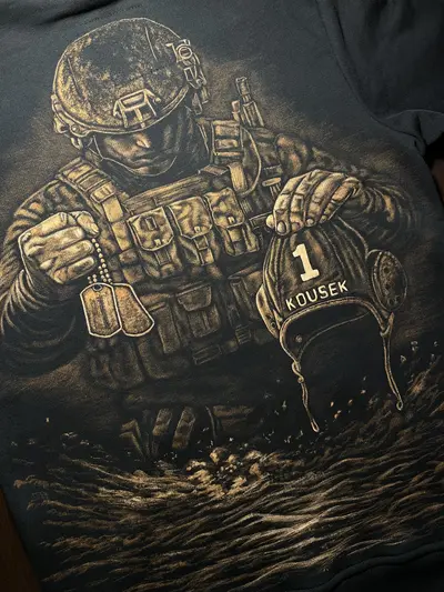 Close-up of a soldier holding military dog tags and a water polo cap in bleach art style