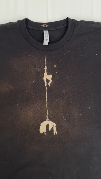 Video showing the miniature Spider-Man rescue scene on the front of the T-shirt