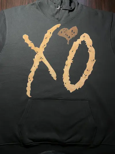 Front XO logo with heart hand-painted bleach art design
