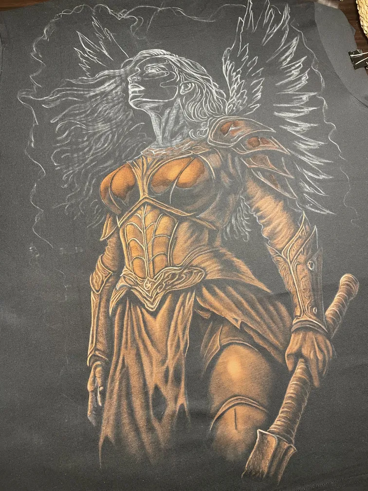 Work in progress of a Valkyrie warrior illustration painted with bleach on a t-shirt