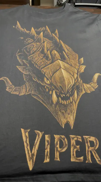 Front view of a bleach art t-shirt featuring a Viper-inspired Dota 2 hero illustration and character name on black cotton fabric
