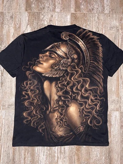 Full back view of hand-painted Warrior Queen bleach art T-shirt with mythology-inspired warrior woman design