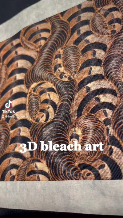 Abstraktes 3D Bleach Art Design auf schwarzem Stoff – Strukturmuster Prozess
